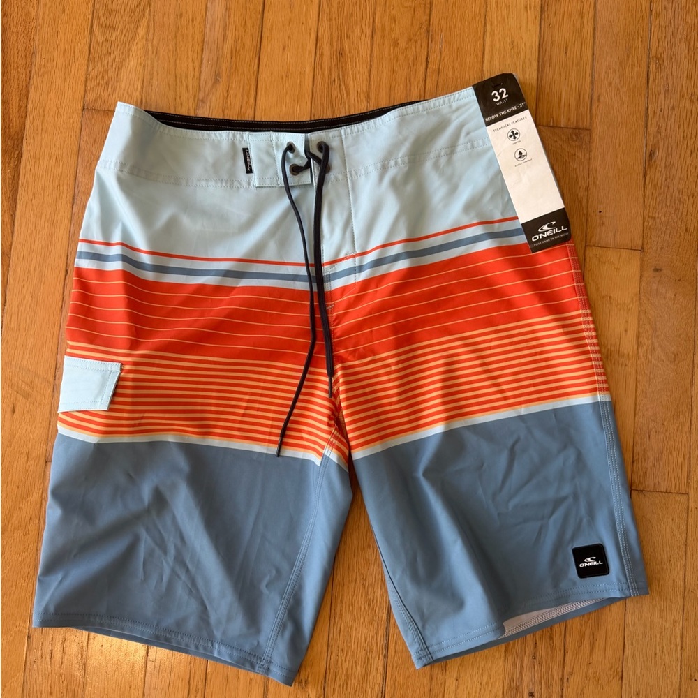 O'Neill Men's Blue and Orange Board Shorts. 32” waist, 21” inseam. NWT.